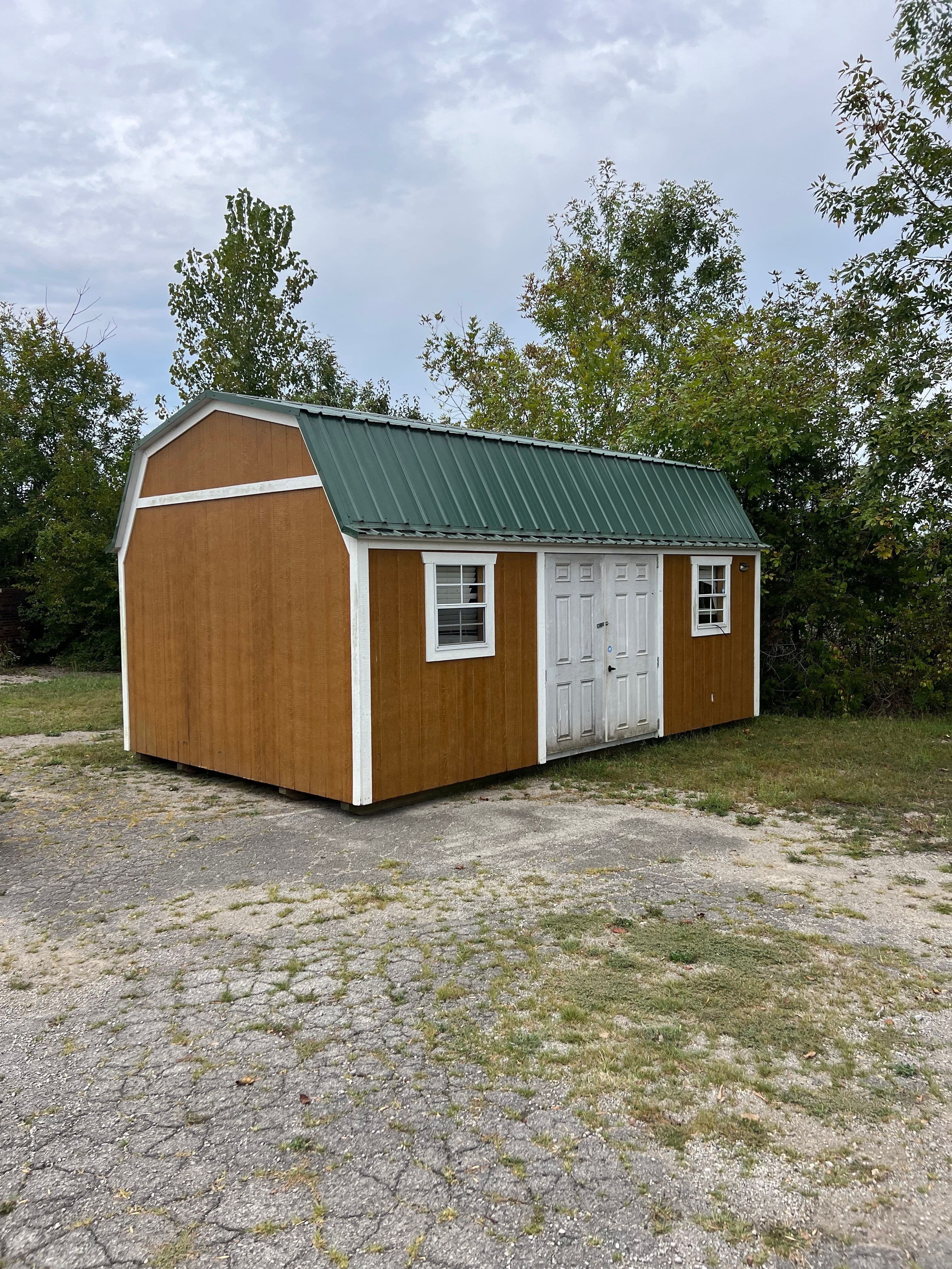 Repo building 12x20 Garden Shed, sells new for $6929 but this repo is reduced to $5500 + tax delivered free with our delivery area!